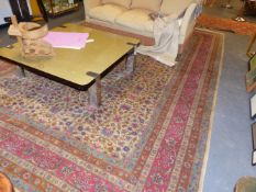 AN ORIENTAL CARPET OF PERSIAN TABRIZ DESIGN. 424x298cms.