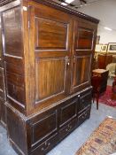 AN 18TH.C.LARGE OAK LIVERY CUPBOARD. 152cms WIDE