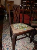 A SET OF FOUR GEORGIAN MAHOGANY DINING CHAIRS.