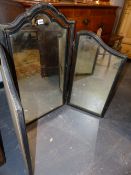 AN EBONISED FRAME TRIPTYCHE MIRROR