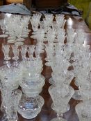 A SUITE OF 19TH CENTURY EUROPEAN GLASSWARE COMPRISING, 17 WINE GLASSES, 17CM HIGH, 11 WINE