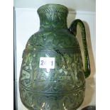 AN ISLAMIC ENGRAVED GLASS EWER. 26CM HIGH