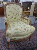 A PAIR OF FRENCH CARVED SHOW FRAME LARGE SALON ARMCHAIRS.