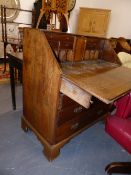 A GEO.III.OAK FALL FRONT BUREAU WITH TWO SHORT AND THREE LONG DRAWERS. 92cms WIDE.