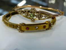 A 9ct.GOLD STIFF BRACELET SET WITH PERIDOT AND SEED PEARLS TOGETHER WITH ANOTHER BRACELET SET WITH