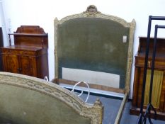 A GOOD QUALITY FRENCH CARVED SHOW WOOD FRAMED DOUBLE BED WITH GILT AND PAINTED DECORATION.