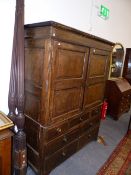 A LARGE 18TH.C.OAK LINEN CABINET ON SEVEN DRAWER BASE. 148cms WIDE TOGETHER WITH A PAIR OF ANTIQUE