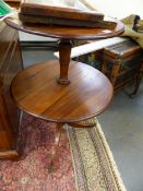 AN EARLY 19TH.C.MAHOGANY TWO TIER DROP LEAF DUMB WAITER ON TRIPOD SUPPORTS. 85cms HIGH