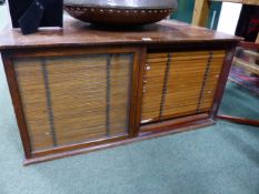 AN EARLY 20TH.C.MAHOGANY SLIDE CABINET FITTED FOR 44 DRAWERS. 94cms WIDE