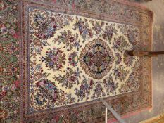 A PERSIAN TABRIZ RUG. 209x157cms.