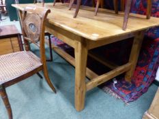 A LARGE PINE REFECTORY STYLE SCULLERY TABLE. 204cms LONG