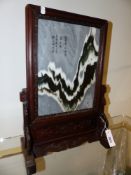 A CHINESE MARBLE PLAQUE WITH INSCRIPTION MOUNTED AS A TABLE SCREEN