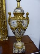 A PAIR OF FRENCH CARVED MARBLE AND GILT BRONZZE MOUNTED URN FORM TABLE LAMPS. APPROX 53cms HIGH