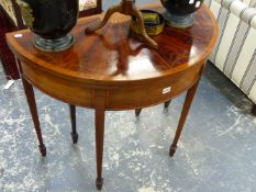 A GOOD REGENCY MAHOGANY SATINWOOD BANDED AND INLAID DEMI LUNE FOLD OVER CARD TABLE. 89cms WIDE