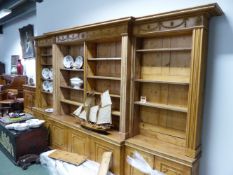 AN IMPRESSIVE LARGE 18TH.C.AND LATER PINE BREAKFRONT OPEN BOOKCASE. APPROX 368cms WIDE x 232cms