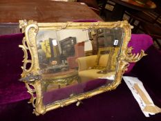 AN ANTIQUE GILT FRAMED PIER MIRROR . APPROX 84cms HIGH.