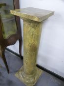 A LARGE FAUX MARBLE DECORATED DISPLAY COLUMN. 108cms HIGH.