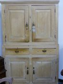 A VICTORIAN PINE HOUSEKEEPER'S CUPBOARD WITH FOUR DOORS AND TWO DRAWERS. 122cms WIDE.