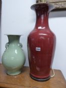 A LARGE CHINESE SANG DE BOUEF VASE MOUNTED AS A LAMP. 57CM HIGH AND A CELADON VASE WITH APPLIED RING