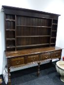 AN 18TH.C.OAK DRESSER WITH PLATE RACK OVER. 190cms WIDE