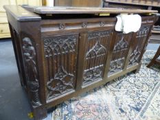 A 19TH.C.CARVED OAK BLANKET CHEST TOGETHER WITH A MATCHING CARVED OAK HALL CABINET AND A QUANTITY OF