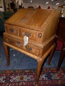 A SMALL EDWARDIAN MAHOGANY LADIES WRITING BUREAU. 65cms WIDE