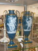 A PAIR OFMINTON LIMITED EDITION PATE SUR PATE VASES AND COVERS. COMMEMORATING MINTON'S