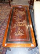 AN ANTIQUE CHINESE CARVED AND INLAID PANEL OF VARIOUS TRADES PEOPLE INVOLVED IN TEXTILE