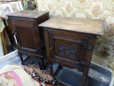 AN ANTIQUE OAK POT CUPBOARD WITH CARVD PANEL DOOR AND A SIMILAR EXAMPLE. 84cms HIGH