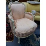A NEAR PAIR OF FRENCH TUB ARMCHAIRS AND A SIMILARLY UPHOLSTERED FOOTSTOOL
