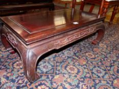 A CHINESE CARVED HARDWOOD LOW TABLE WITH INCURVED LEGS, W 84cms