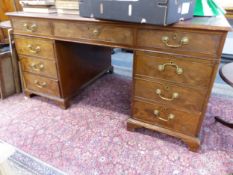 A LARGE 19TH.C.MAHOGANY TWIN PEDESTAL PARTNER'S DESK WITH TOOLED RED LEATHER INSET TOP. 155cms WIDE