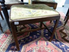 AN ANTIQUE MAHOGANY DRESSING STOOL WITH TAPESTRY TOP.