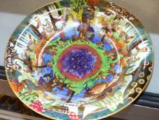 A WEDGWOOD FAIRYLAND LUSTRE SHALLOW BOWL DECORATED WITH THE GONDOLA PATTERN 24968, DESIGNED BY DAISY