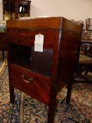 A 19TH.C.MAHOGANY RISING TOP WASHSTAND WITH TAMBOUR FRONT. 55cms WIDE.