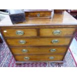 A SMALL GEORGIAN MAHOGANY CHEST OF TWO SHORT AND THREE LONG GRADUATED DRAWERS ON OGEE BRACKET FEET
