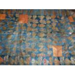 A JAPANESE SILK PATCHWORK PANEL WITH CLOUD MOTIFS ON A BLUE FIELD