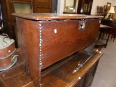 A 17TH.C.OAK PLANK COFFER. 96cms WIDE.