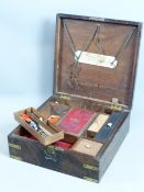 AN ANTIQUE BRASS BOUND MAHOGANY CAMPAIGN FITTED LIFT TOP WORK BOX. LABELLED G. WATER, CHARTERHOUSE