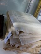 SIX UNBLEACHED LINEN SHEETS AND CLOTHS WITH MACHINE STITCHED HEMS, VARYING 2-3 M.