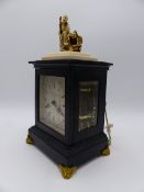 A FINE 19TH.C. SMALL DESK OR BRACKET CLOCK. EBONISED CASE ON GILT BRASS FEET AND SURMOUNTED WITH A