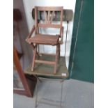 A MINIATURE FRENCH FOLDING CHAIR AND AN IRON FRAMED FOLDING CHAIR.