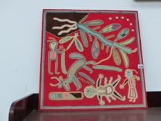 A CREWEL WORK FRAGMENT MOUNTED ON BOARD IN PERUVIAN TASTE.