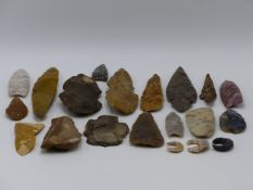 A GOOD COLLECTION OF VARIOUS KNAPPED FLINT SPEARS, AXE, ARROW HEADS AND TOOLS. (20)