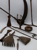 AN AFRICAN IRON CURRENCY SICKLE WITH GEOMETRIC ENGRAVED DECORATION TOGETHER WITH VARIOUS FURTHER