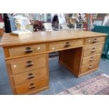 AN ART DECO LARGE PALE OAK PEDESTAL DESK. 175CMS WIDE