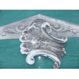 AN ANTIQUE ZINC EMBOSSED PEDIMENT AND APPLIQUE.