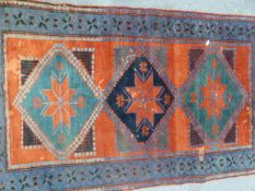 AN ANTIQUE CAUCASIAN KAZAK RUG. 190X114CMS