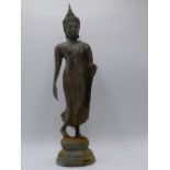 AN EASTERN BRONZE FIGURE OF A STANDING DEITY. HEIGHT 42CMS