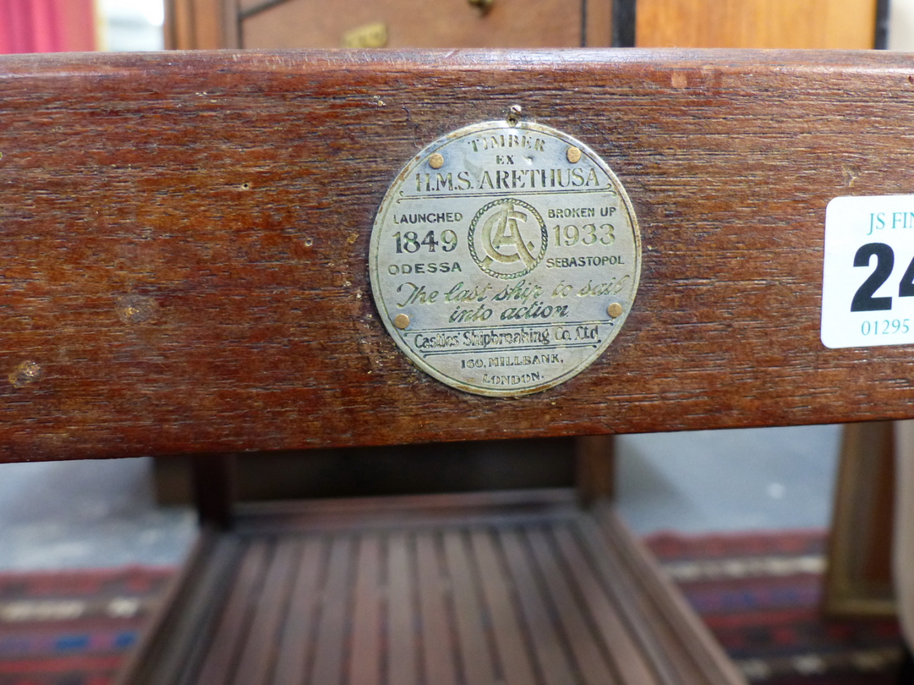 AN EARLY 20TH.C.TEAK TWO TIER SERVING TROLLEY, CONSTRUCTED FROM THE TIMBERS OF HMS ARETHUSA. - Image 2 of 2